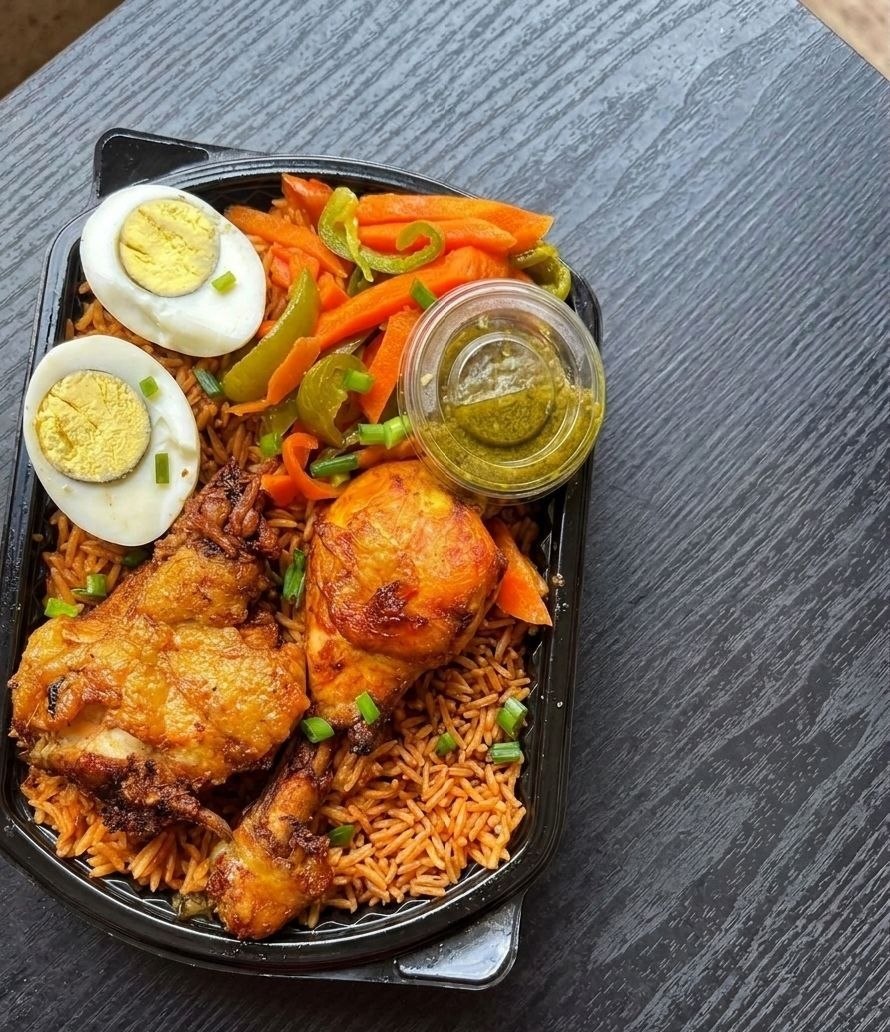 Fried rice, salad and chicken arranged as a custom plate